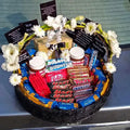 Luxurious Chocolate Basket with Fresh Flowers – A Perfect Sweet Surprise