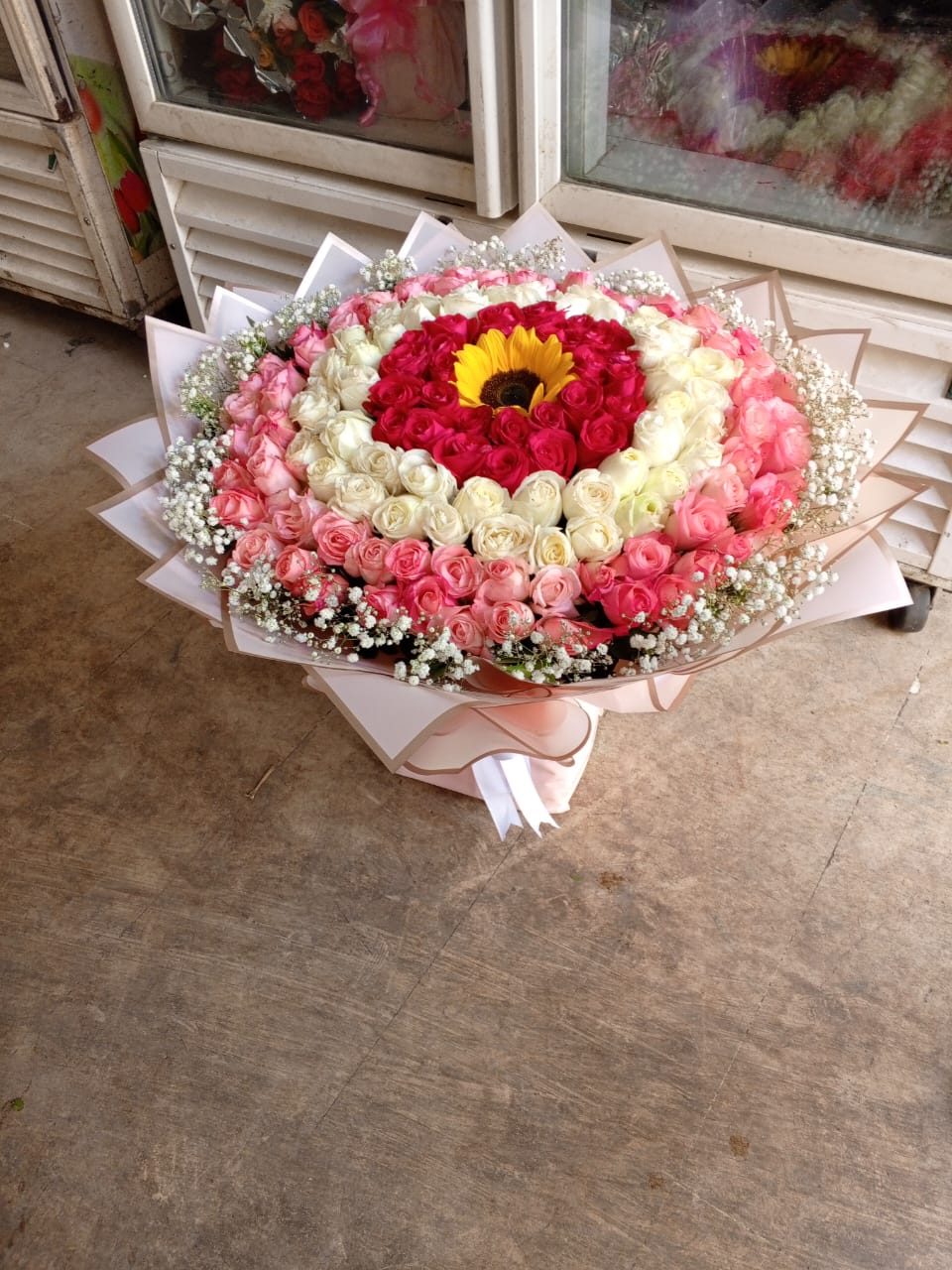 Stunning Mixed Rose Bouquet with Sunflower Centerpiece