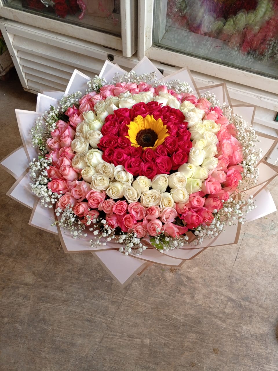 Stunning Mixed Rose Bouquet with Sunflower Centerpiece